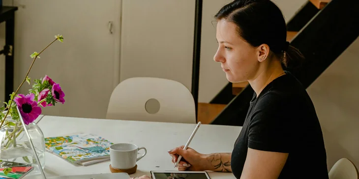 A 3D artist checking her work for inconsistencies before submitting it for review.