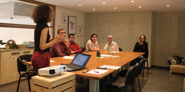 A Benefits Representative conducting a meeting.