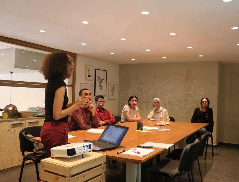 A Benefits Representative conducting a meeting.