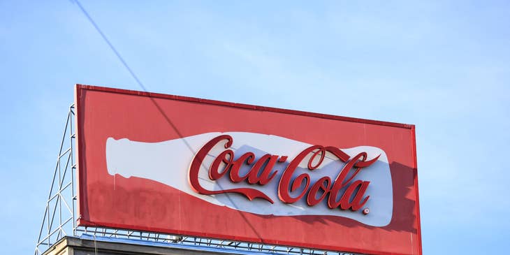 A brand advertising on a billboard.