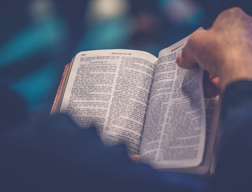 A Christian man reading a Bible.