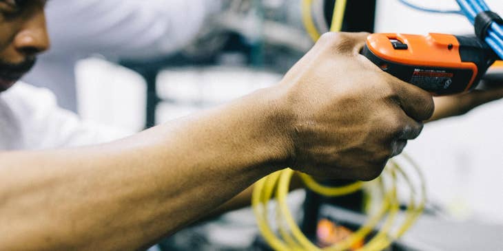 electrical engineer with screwdriver