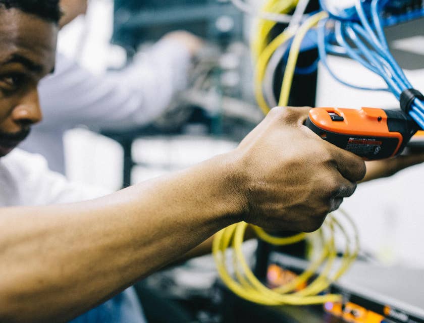 electrical engineer with screwdriver