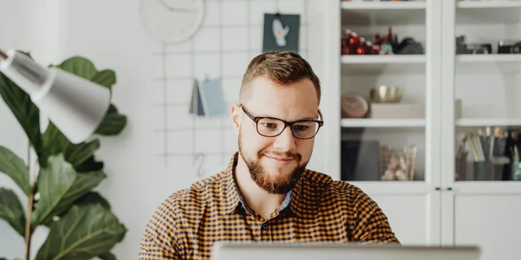 A man working at his desk.