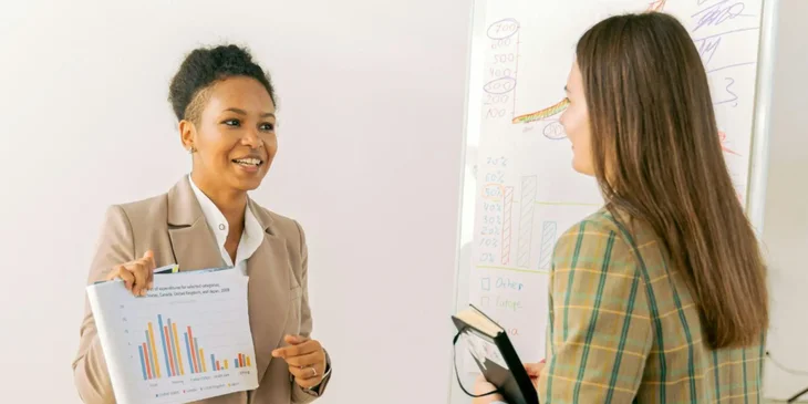 Two marketing experts giving a presentation.