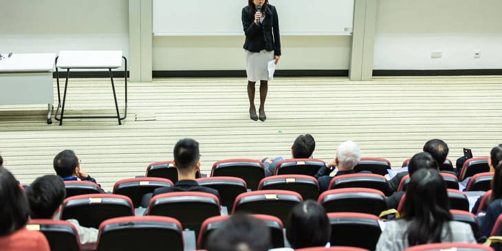 Chief Invigilator provides instructions to test-takers before the examination