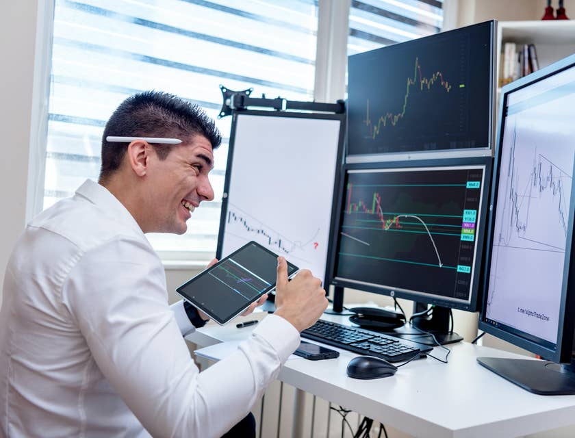 Compliance Manager is very happy comparing graphs on his computer and his tablet