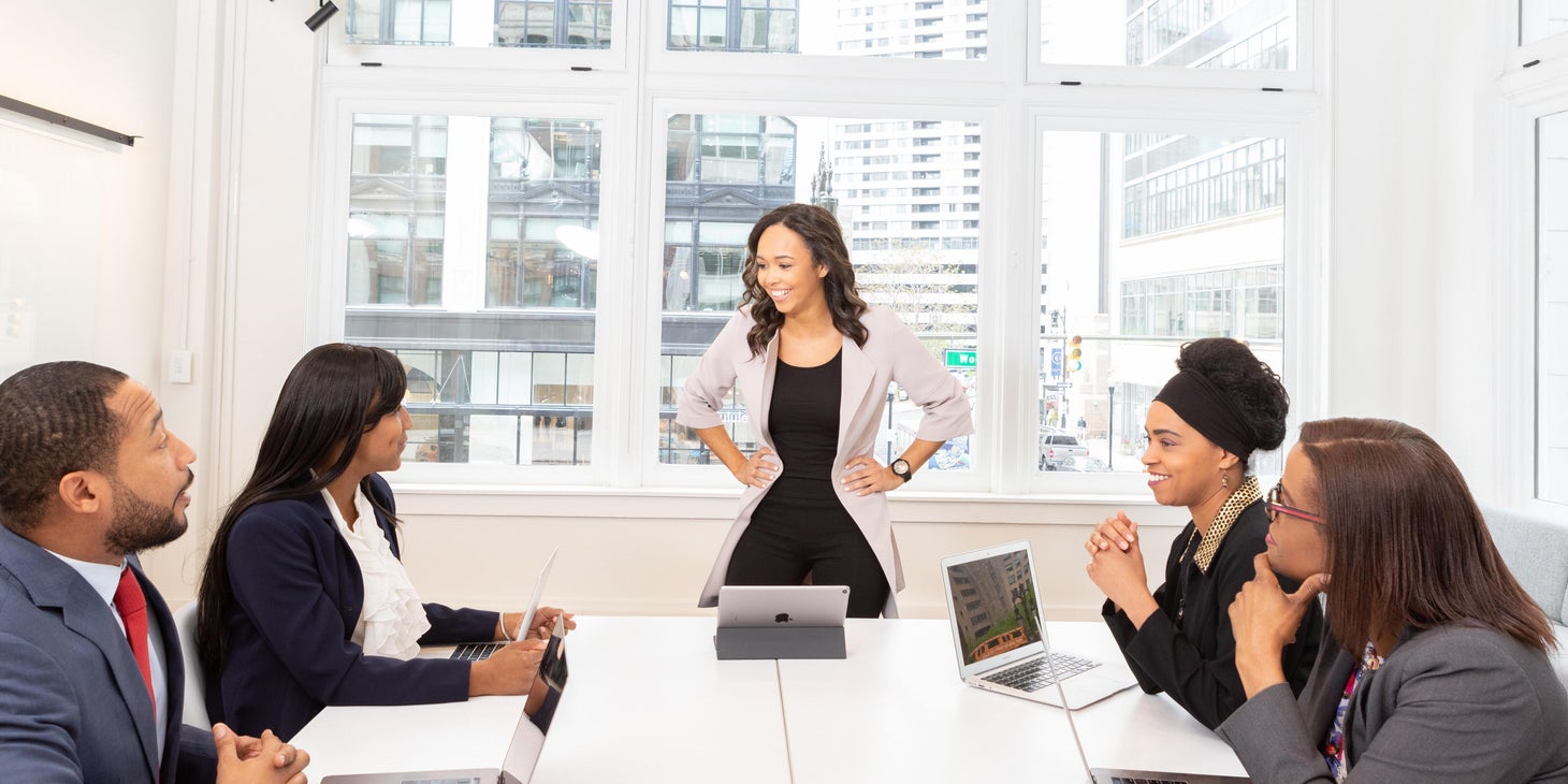 Compliance Specialist is having a meeting with her colleague to discuss new office policies