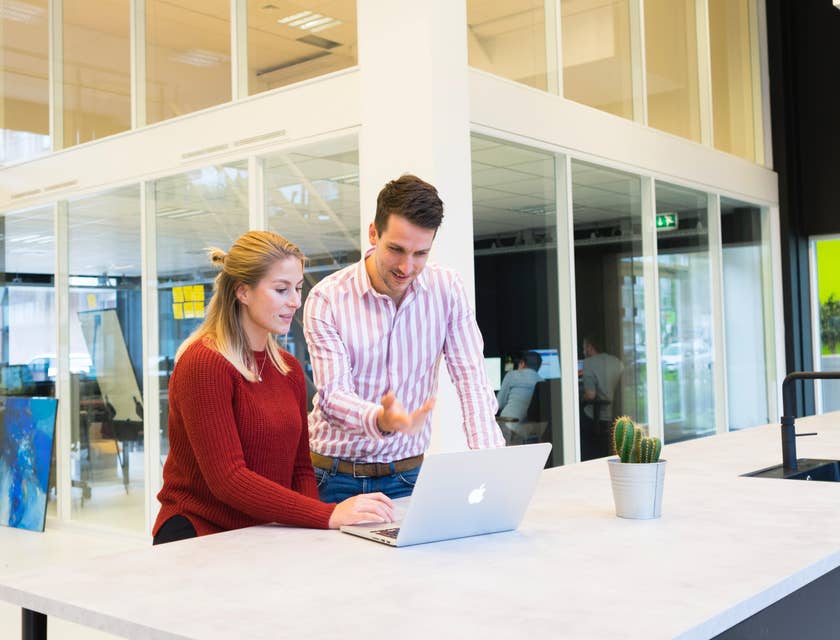 Image Consultant is showing his client ways to improve business image.