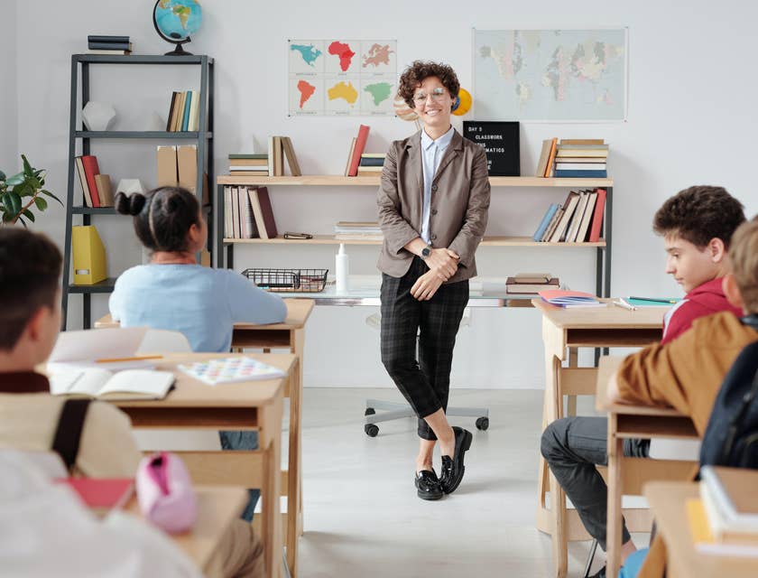 Intervention Specialist smiles as she listens to her students' stories