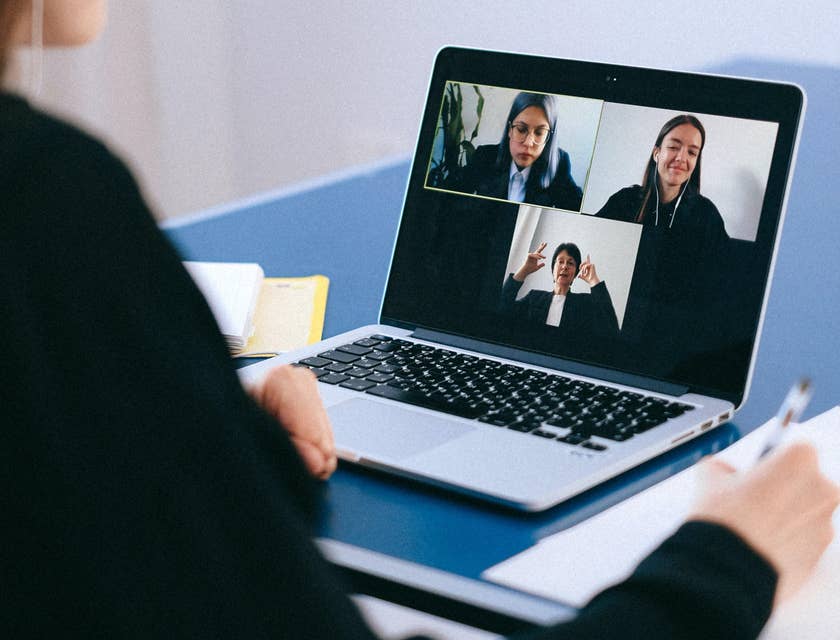 Job Coach is on a video call with clients to help them prepare for their job interviews