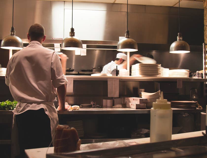 Kitchen manager overseeing food preparation