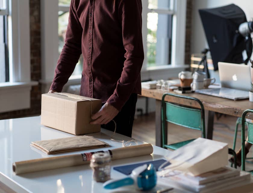 Mail Processing Clerk sorting different types of mail