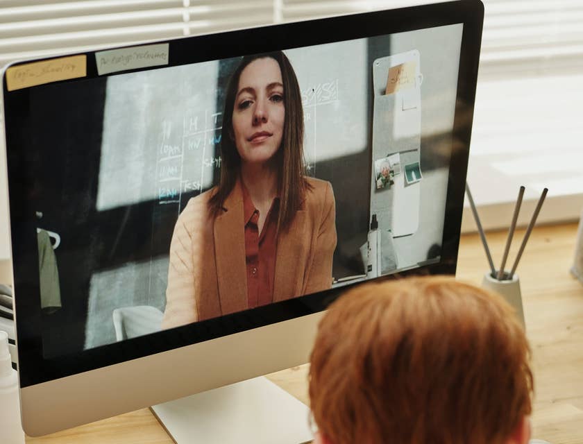 Online ESL teacher waits patiently for the student to finish the activity