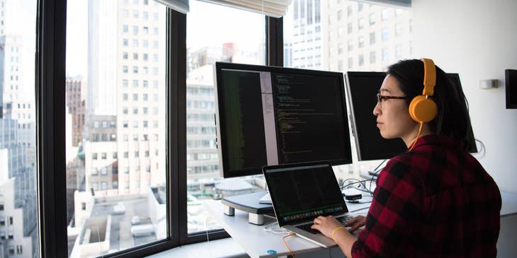 Operations research analyst thinking of new ideas while listening to music