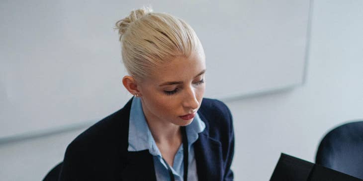 Payroll manager checks the documentation of payroll data during a meeting