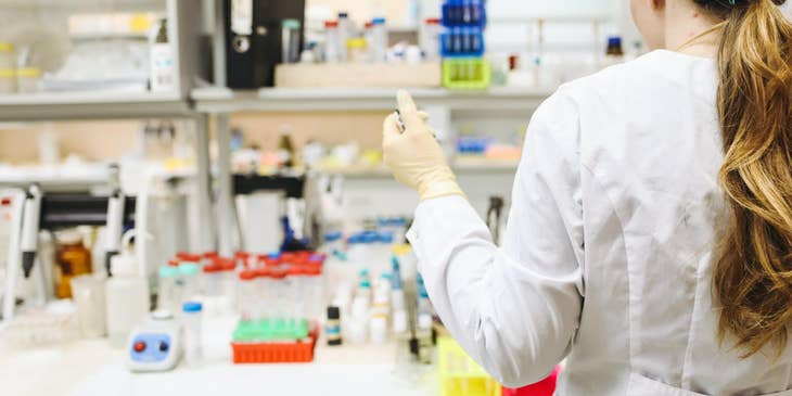 Pharmacy assistant taking inventory on the medical supplies in the laboratory