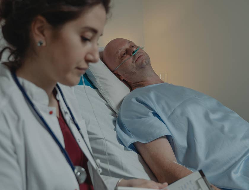 Psychiatric Nurse monitoring mental health patient while administering medications