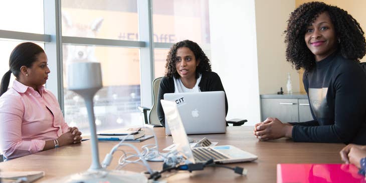 Public relations officer attending a PR campaign meeting