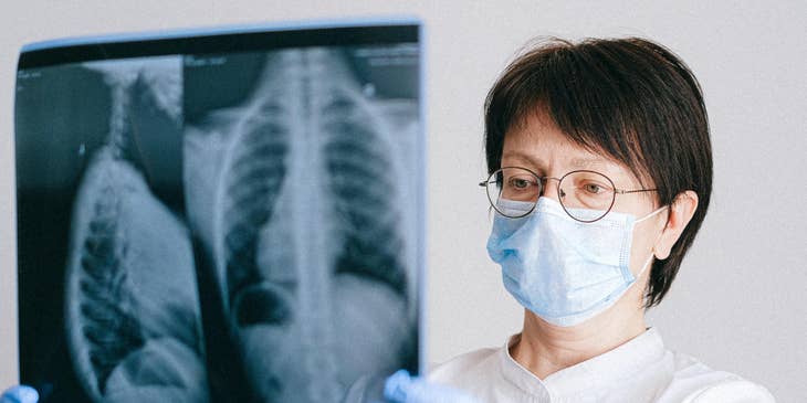 Pulmonologist reads the Xray results to determine diagnosis