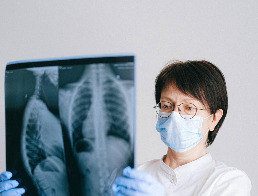 Pulmonologist reads the Xray results to determine diagnosis