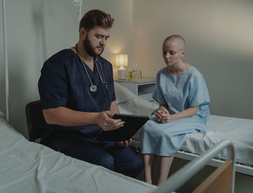 Telemetry nurse shows patient treatment plans and medication schedules as prescribed by the doctor