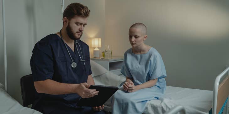 Telemetry Nurse shows patient treatment plans and medication schedules as prescribed by the doctor