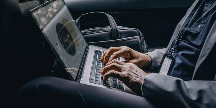 Travel agent on his laptop.
