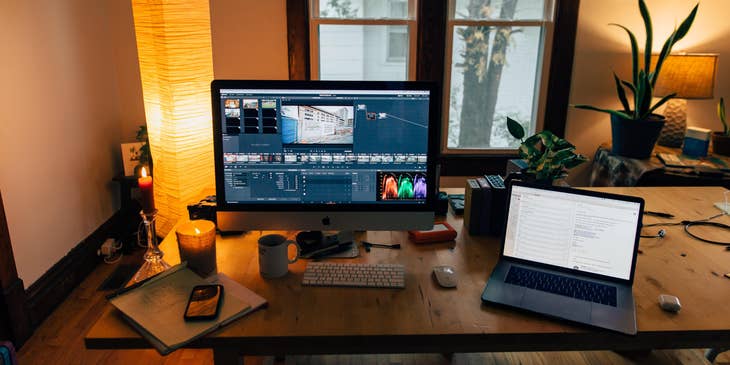 Video editor workstation with two visible screens