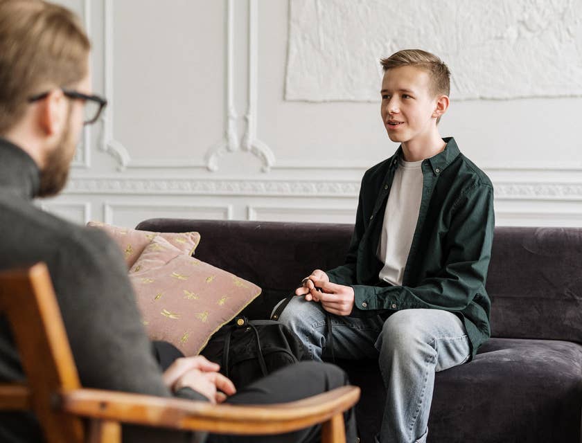 Vocational Rehabilitation Counselor listens to a patient while evaluating his experiences for possible employment