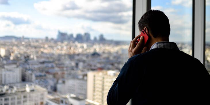 Account Executive calling a client to update about the new company offering.