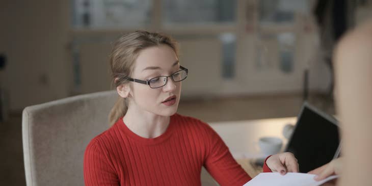Accounting Coordinator receiving a document