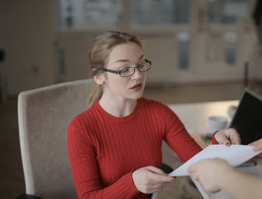 Accounting Coordinator receiving a document