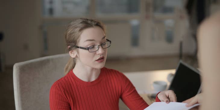 Accounting Coordinator receiving a document