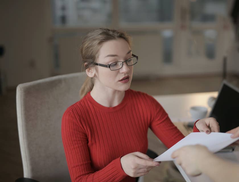 Accounting Coordinator receiving a document