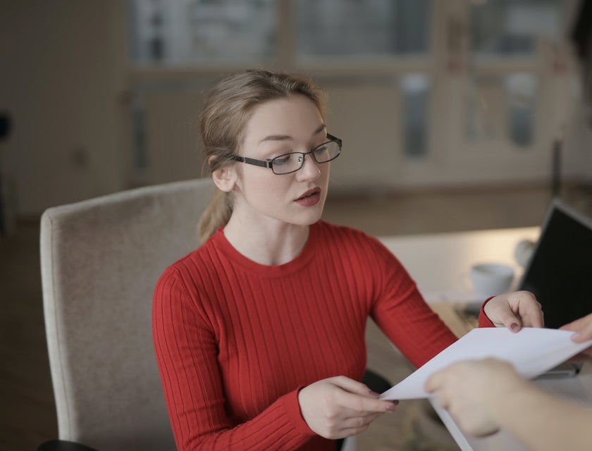 Accounting Coordinator receiving a document