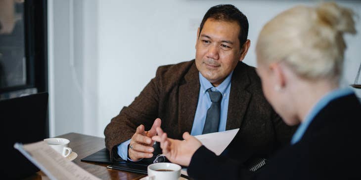 Advertising Sales Representative negotiating with client about the best advertisement for their product