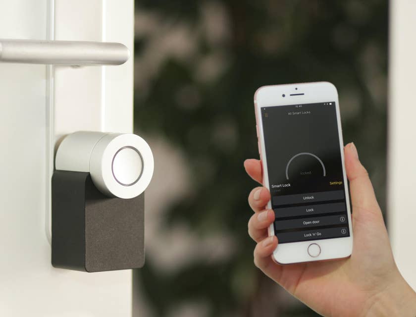 Alarm Technician installing a smart alarm system