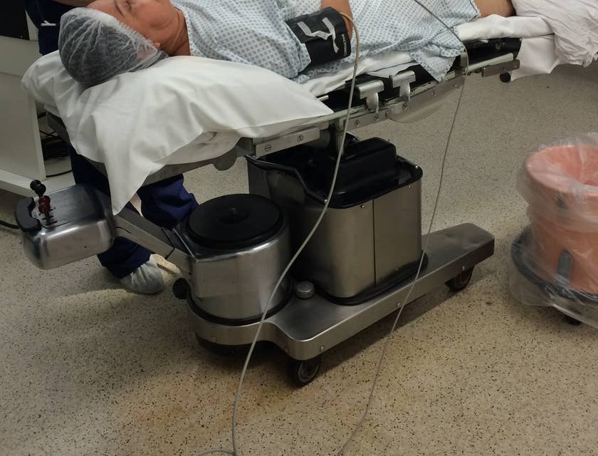 An Anesthesiologist monitoring the patient after administering anesthesia.