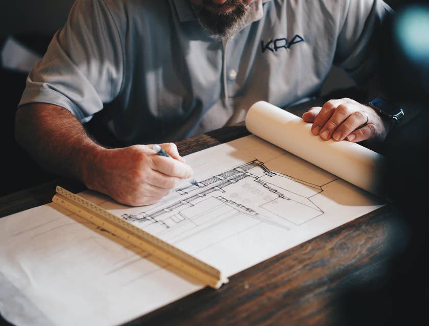 An architect reviewing architectural plans.