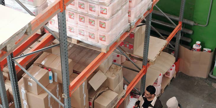 Assistant Buyer monitoring the inventory stocks with the warehouse workers