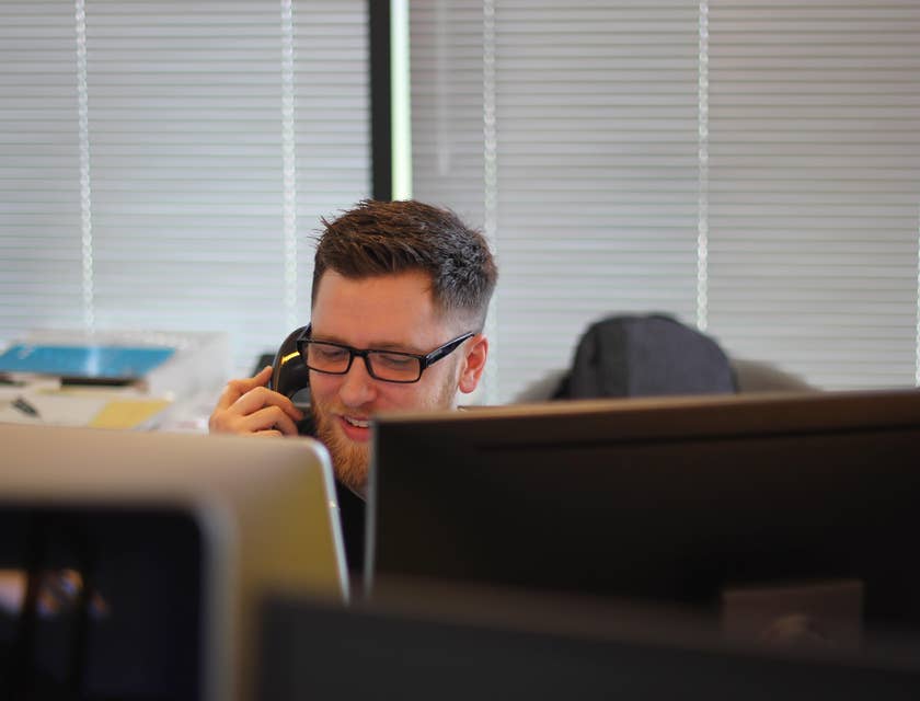 Assistant on a call with the supplier requesting replenishment of office supply