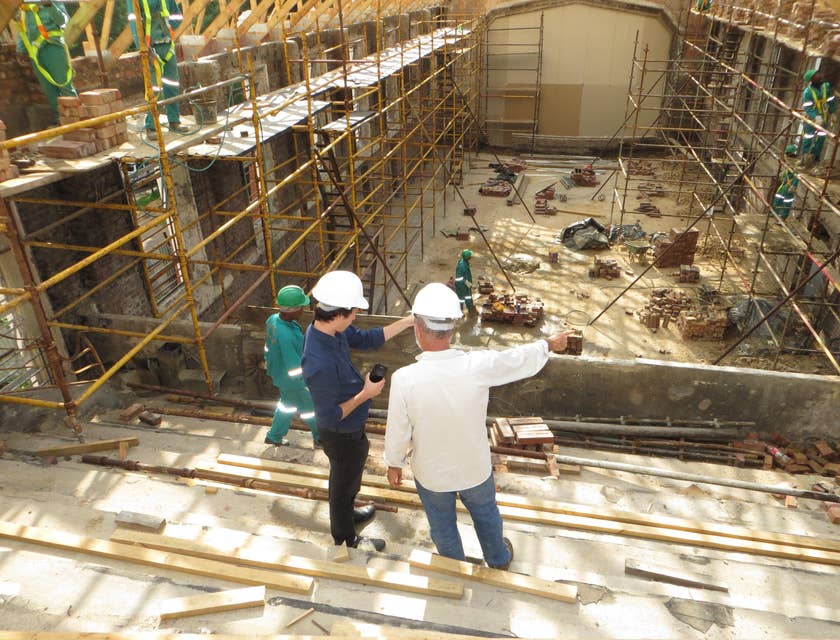 Assistant Site Manager coordinates with the building Architect in a construction site.