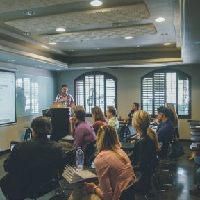 Attend workshops and seminars on education.