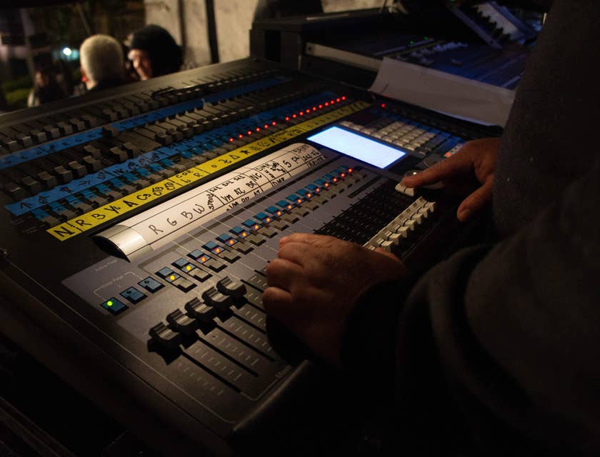 Audio Engineer working on a sound board