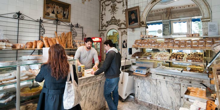 Bakery Assistant checking out customer's purchases
