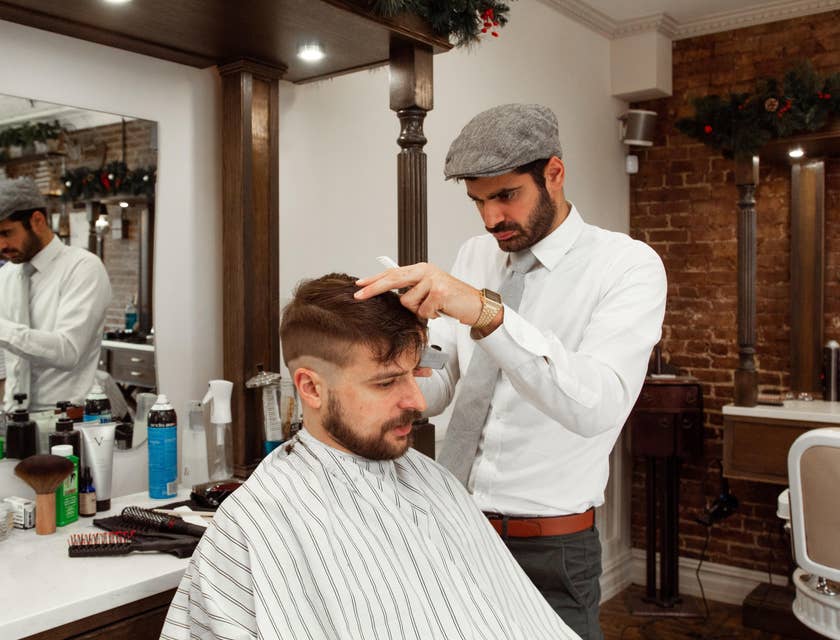 Barber cutting a client's hair