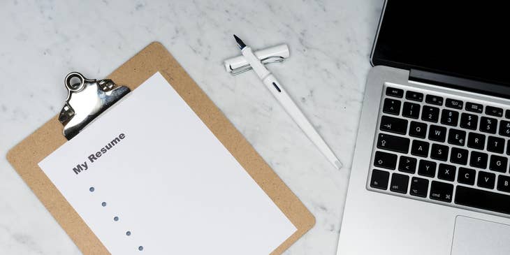 Clipboard with a page on it that reads 'my resume'