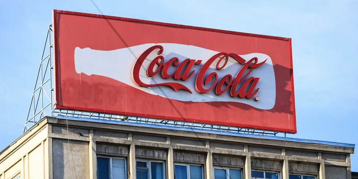 A brand advertising on a billboard.