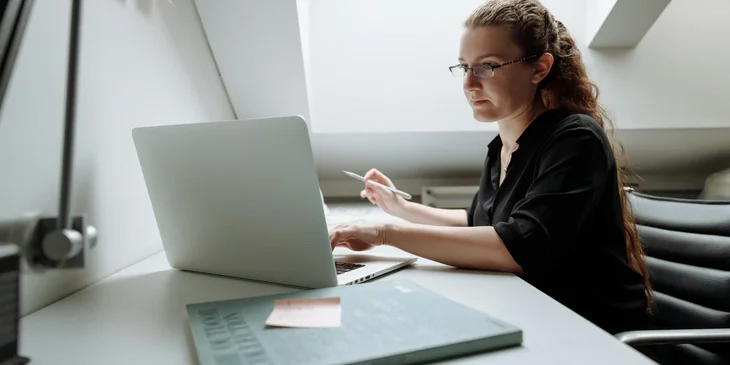 A female architect using a laptop.